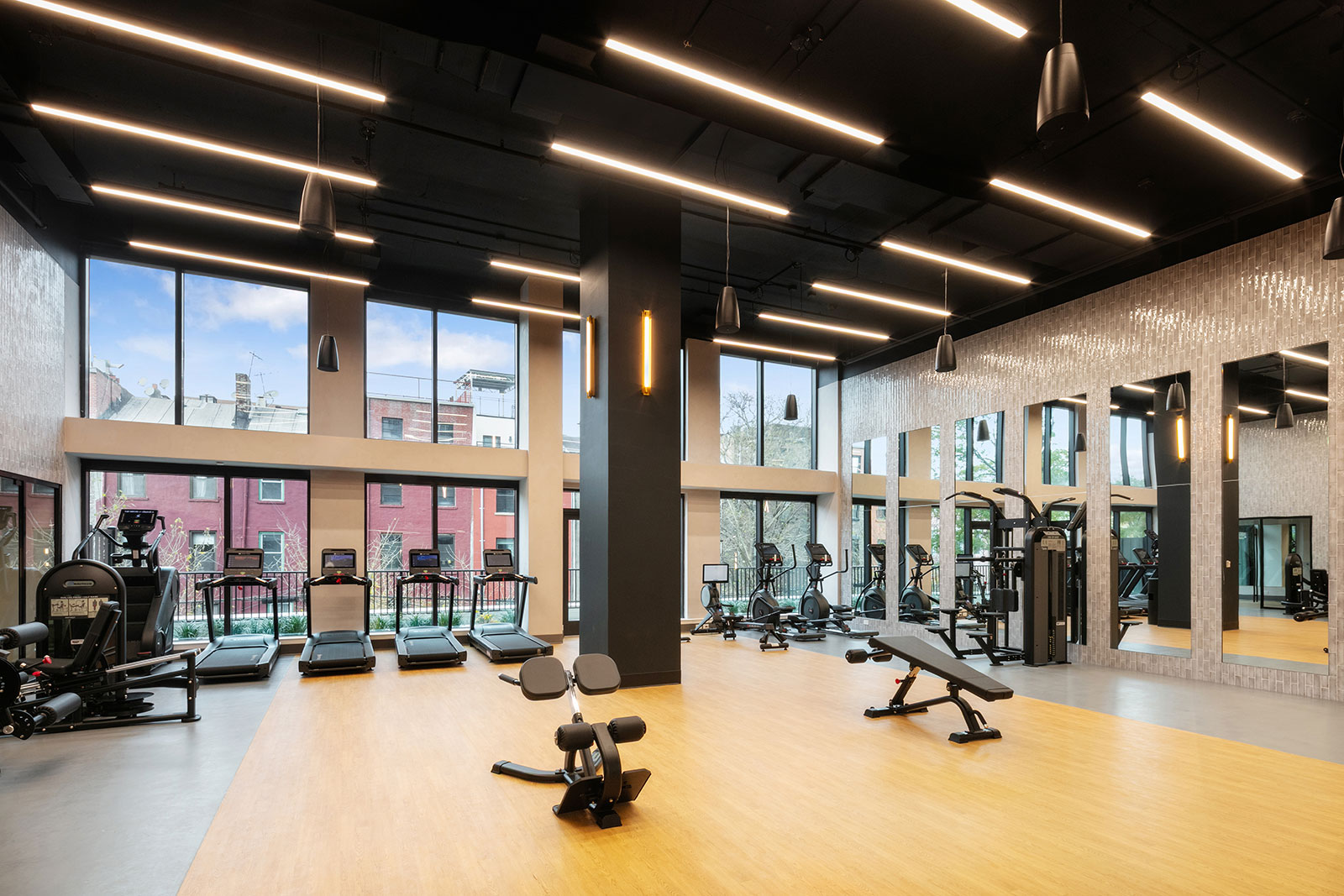 Luxury amenities at AtlanticBK Bed-Stuy apartments including golf simulator